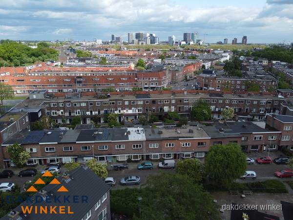 Luchtfoto van daken in woonwijk Winkel Luchtfoto van daken in woonwijk Winkel